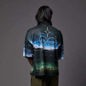 Blurred Field Over Polo Tee